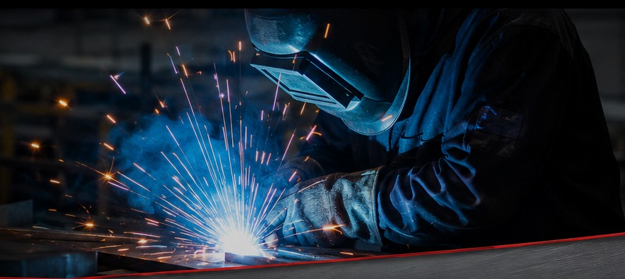 Welder fabricating a pipeline product
